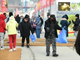 화천군 깨끗한 산천어축제의 비밀 끊임없는 자원봉사 릴레이 기사 이미지